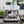 Load image into Gallery viewer, Breville Barista Pro Espresso Machine in Sea Salt White on Countertop near window
