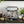 Load image into Gallery viewer, Breville the Dual Boiler Espresso Machine on Countertop with Coffee &amp; milk
